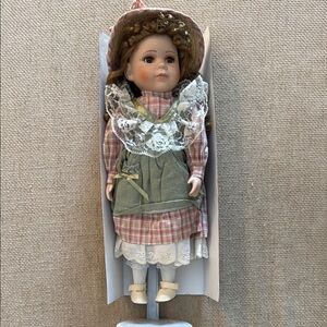 Vintage Style Porcelain Doll with Plaid Dress